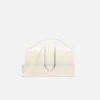 The large Bambino Cross-body metal flap bag