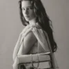 The long Bambino Long metal flap bag