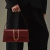 The long Bambino Long metal flap bag