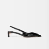 The low Duelo slingbacks Circle and square kitten heels