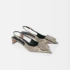 The low Duelo slingbacks Circle and square kitten heels