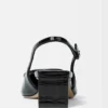 The low Duelo slingbacks Circle and square kitten heels