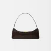 The Ovalo clutch Folded shoulder bag