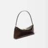The Ovalo clutch Folded shoulder bag