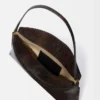 The Ovalo clutch Folded shoulder bag
