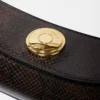 The Ovalo clutch Folded shoulder bag