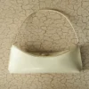 The Ovalo clutch Folded shoulder bag