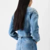 The Ovalo de-Nîmes denim jacket Curved denim jacket