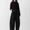 The Ovalo de-Nîmes denim pants High-waisted curved jeans