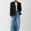 The Ovalo de-Nîmes denim pants High-waisted curved jeans