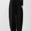 The Ovalo de-Nîmes denim pants High-waisted curved jeans