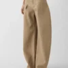 The Ovalo de-Nîmes denim pants High-waisted curved jeans