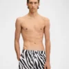 The Puntini swimsuit Zebra Arty print swim shorts