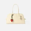 The strawberry Origami strawberry-shaped bag charm