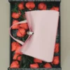 The strawberry Origami strawberry-shaped bag charm